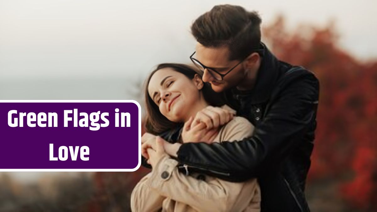 Amazing close up portrait of a cheerful woman laughing with closed eyes while man embracing her from back