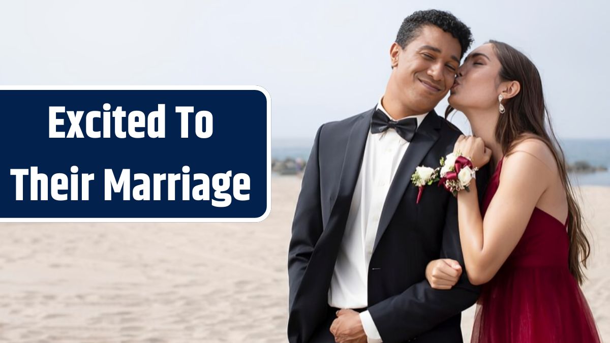 Couple in graduation prom clothing at the beach