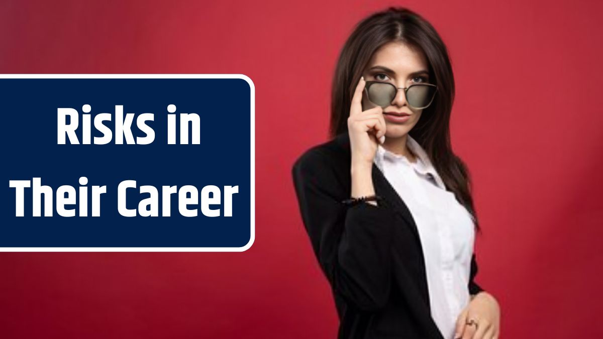 Young businesswoman standing with glasses on red background.