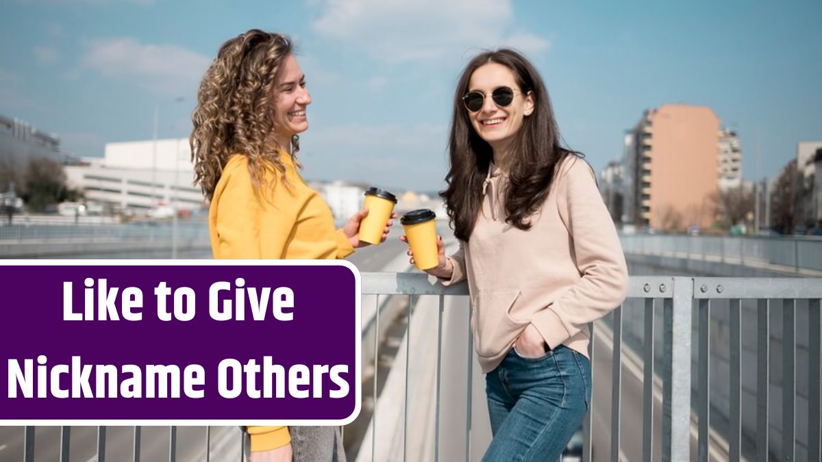 Friends wearing sunglasses holding cup of coffee