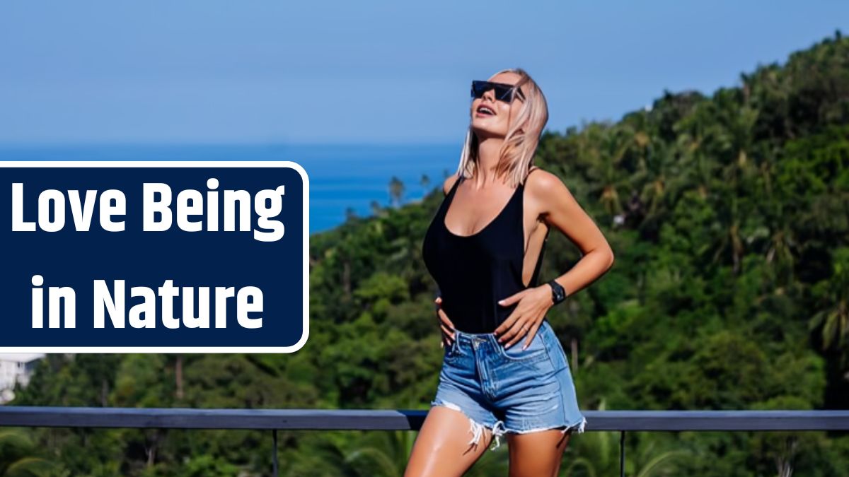 Portrait of fit european woman in swimsuit and denim shorts on vacation