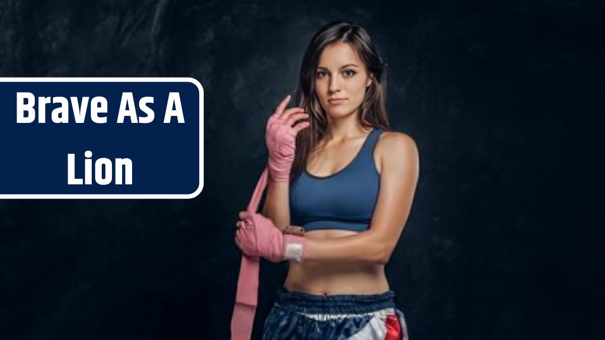 Young attractive woman is wearing special bandages for hands before boxing training.