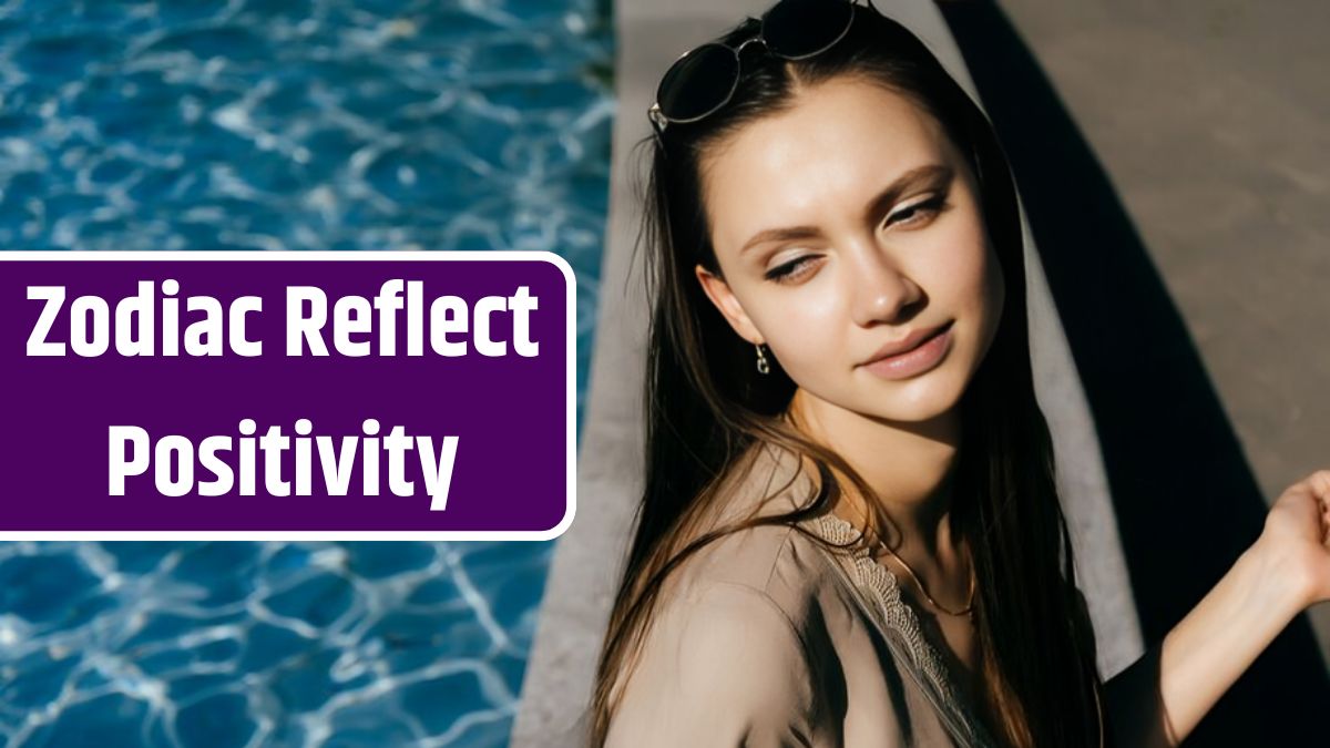 Girl with long hair sitting by the pool and looking away