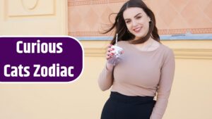 Caucasian girl young woman walking down the street holding coffee to go cup