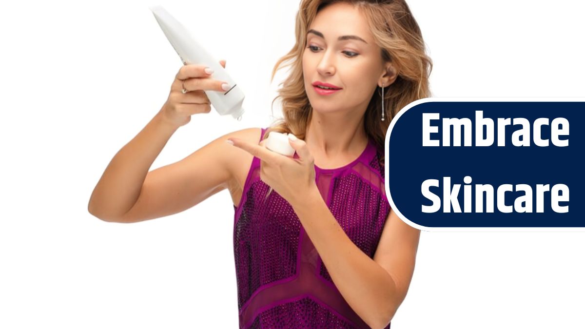 Studio stock photo of a gorgeous young adult woman in her 30s dropping lifting cream from the bottle onto her finger. Testing new anti-age product. Beauty and skincare concept. Isolate on white.