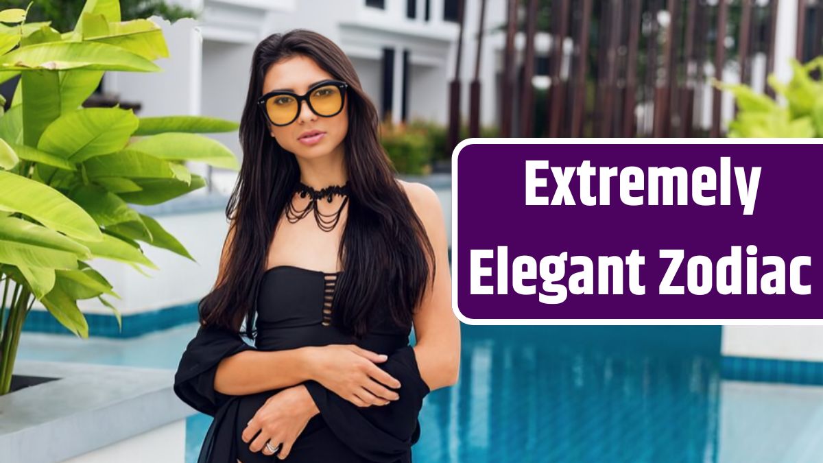 Sensual woman in trendy necklace and black swimwear at the pool