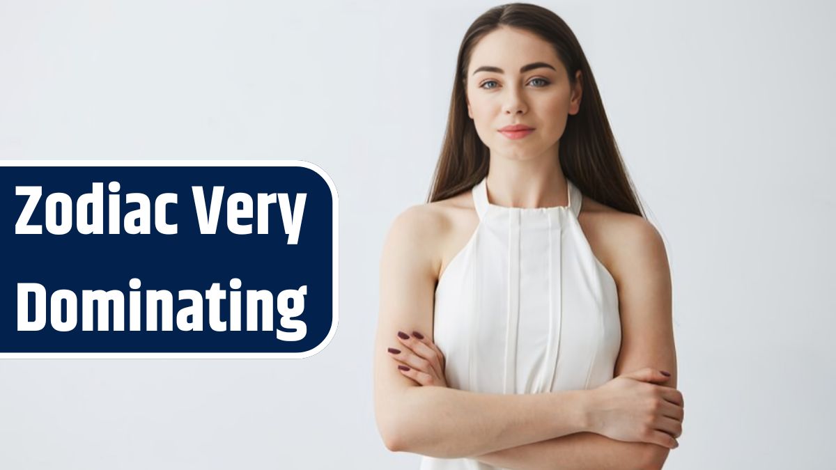 Portrait of young beautiful businesswoman with crossed arms .